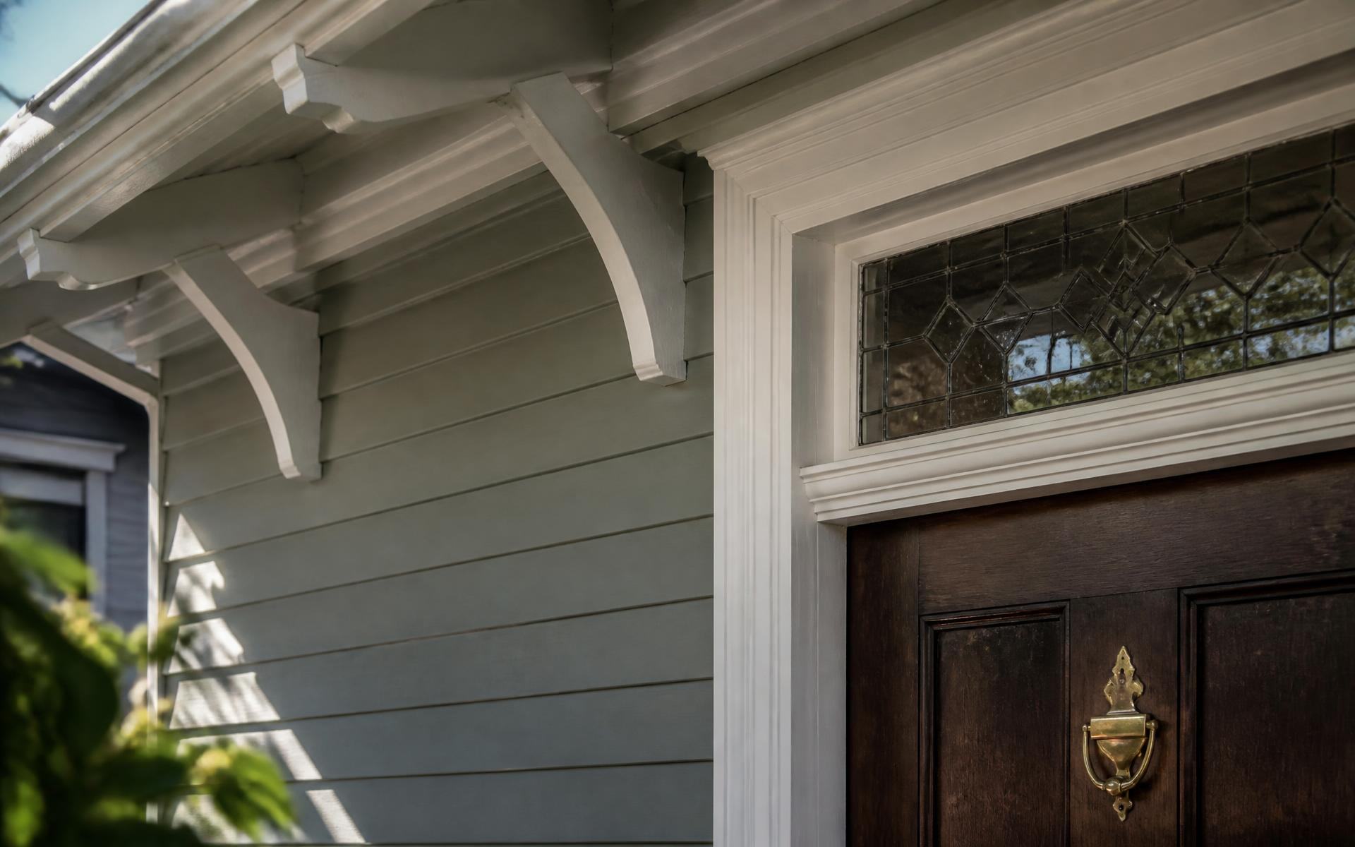 Detail of a historic Dilworth home's porch and roofline