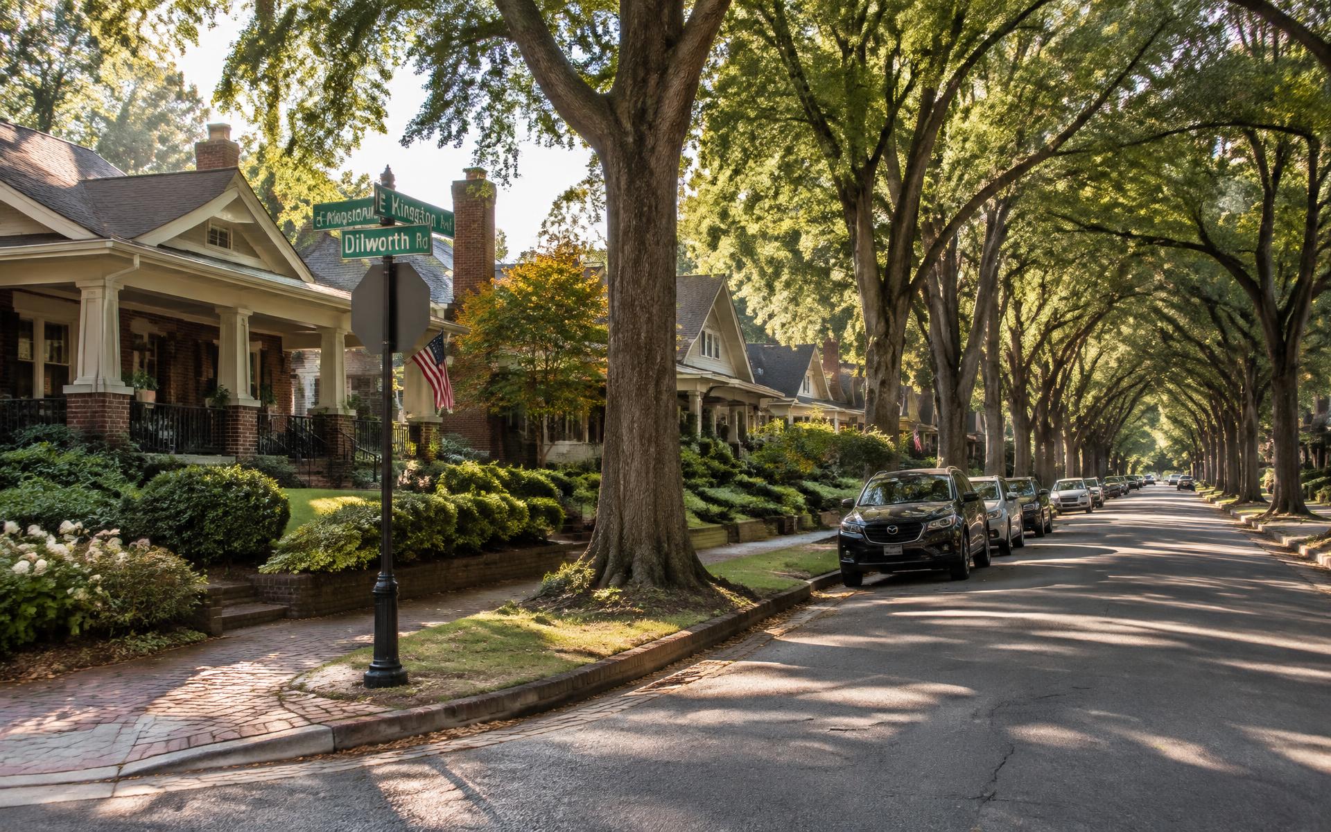Willow oaks arching over a Dilworth residential street of Craftsman bungalows