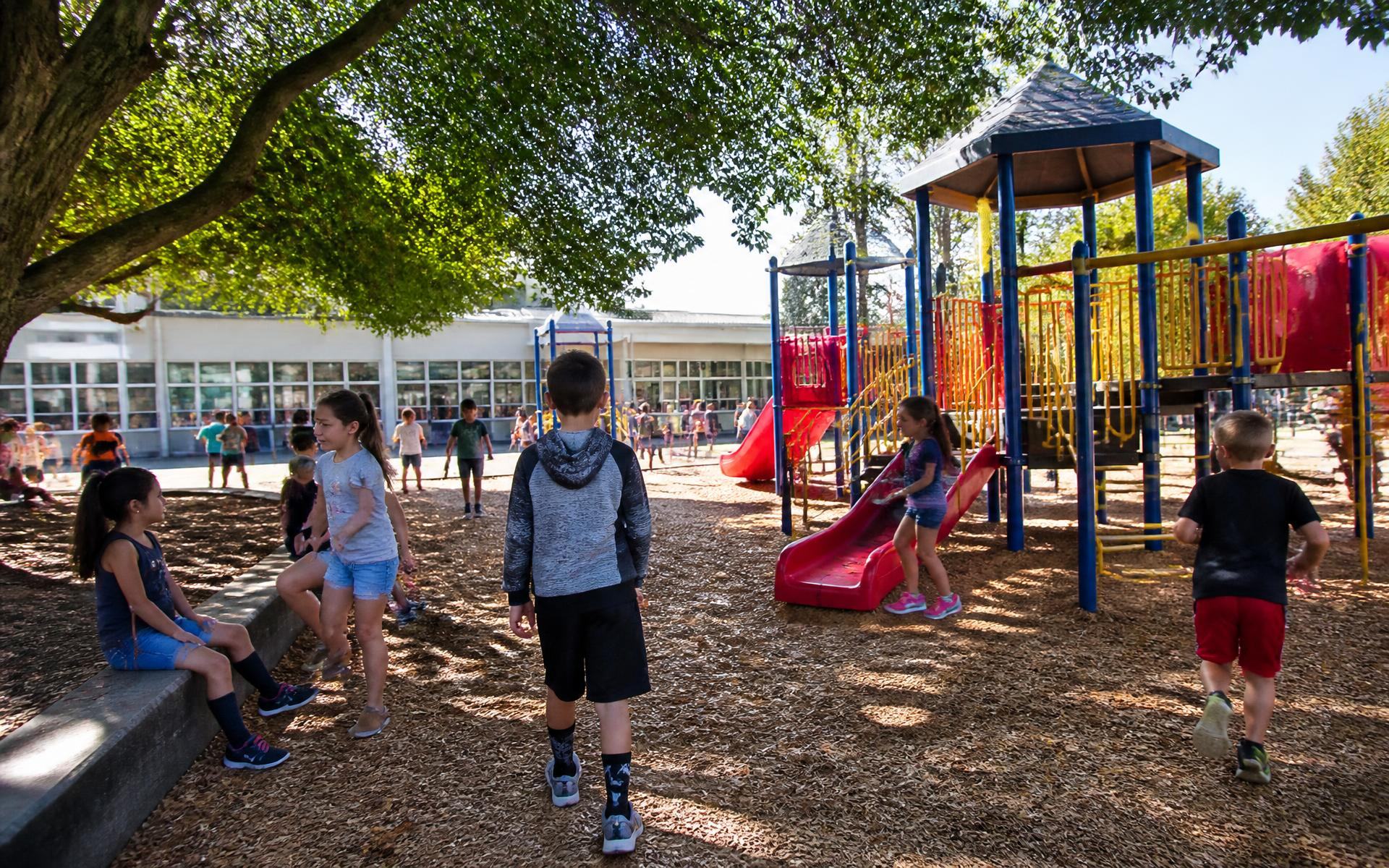 Children at recess on a school playground near Dilworth, Charlotte